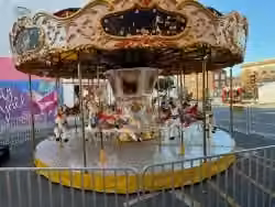 Merry-go-round carousel ride ready for families at an outdoor event