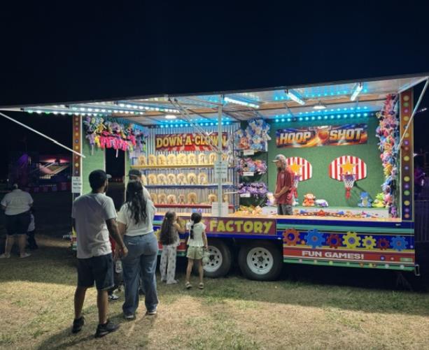 Prize Factory game trailer side view for festival game rentals