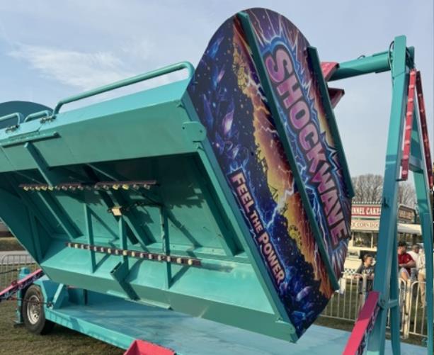 Shockwave carnival ride set up for families at a festival